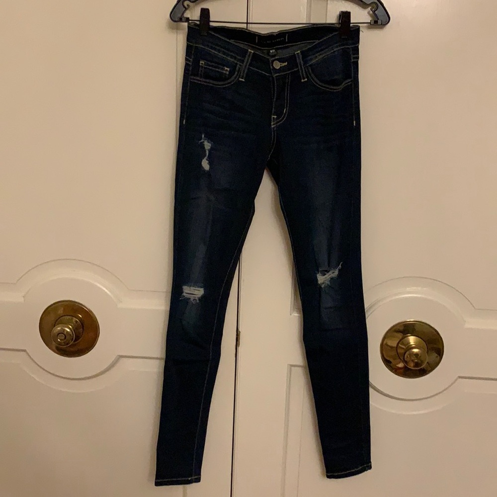 Dark wash skinny Jean with rips size 26